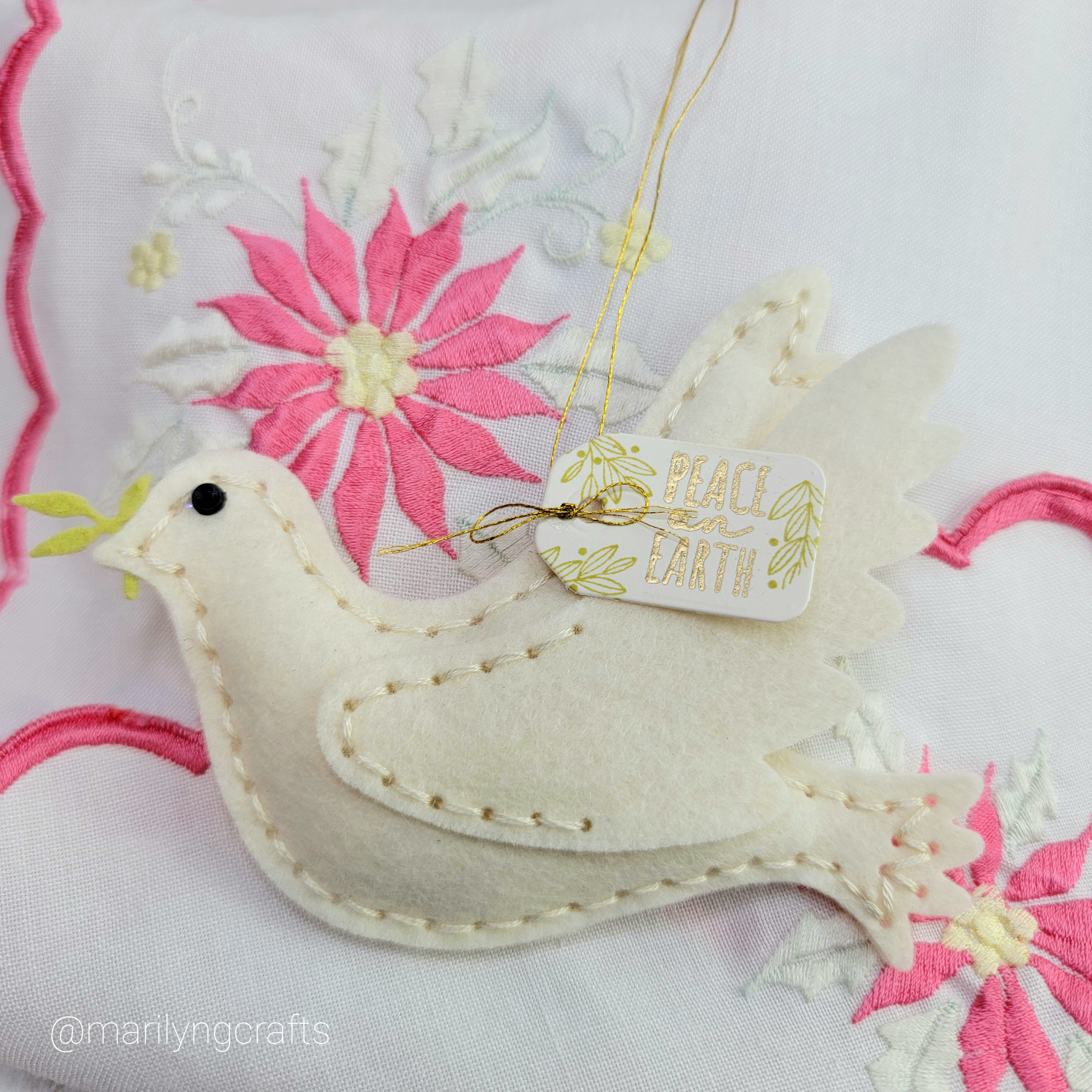 In Stitches: Christmas Dove Die